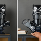 The Lego Marvel Black Panther bust posed with and without its hands in the "Wakanda Forever" pose.
